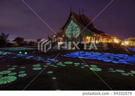 Night View of Wat Sirindhorn Wararam Phu Prao, Glow in the Dark Temple, Ubon Ratchathani, Thailand 64102879
