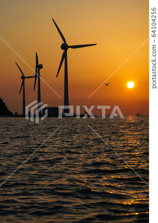 Sunset at the ballistic port in Ansan, with the wind and the silky island in the background 64104256