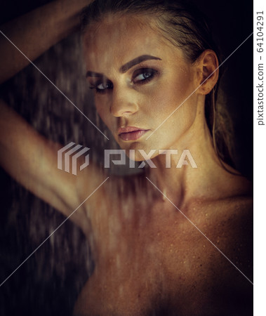 portrait of a sexy fashionable girl in a shower portrait of a sexy fashionable girl in a shower 64104291