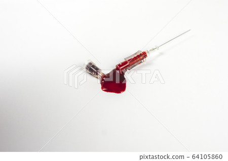 Blood out leaked from the medical syringe needle. Blood out leaked from the medical syringe needle. 64105860