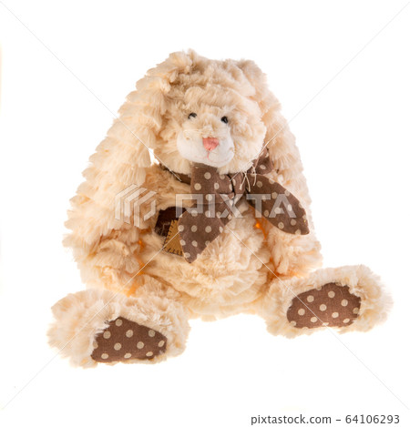 Toy, light beige hare, plush with bath on white background Toy, light beige hare, plush with bath on white background 64106293