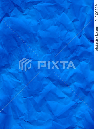 Blue crumpled paper texture background. A close-up Blue crumpled paper texture background. A close-up 64106369