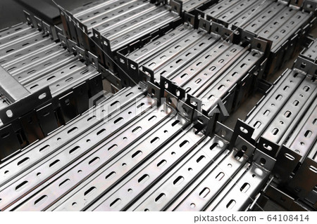 Bent metal profile channel. Zinc steel profile at bundle. Bent metal profile channel. Zinc steel profile at bundle. 64108414