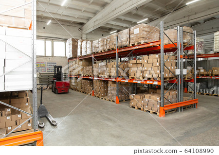 Abstract blurry warehouse storing a lot of stack of large box background. Abstract blurry shelf of packaged product. Abstract blurry warehouse storing a lot of stack of large box background. Abstract blurry shelf of packaged product. 64108990