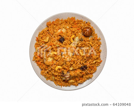 Isolated homemade chicken Biryani.  64109048