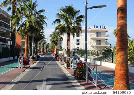 Street in Villeneuve-Loubet resort, Cote d'Azur, France Street in Villeneuve-Loubet resort, Cote d'Azur, France 64109080