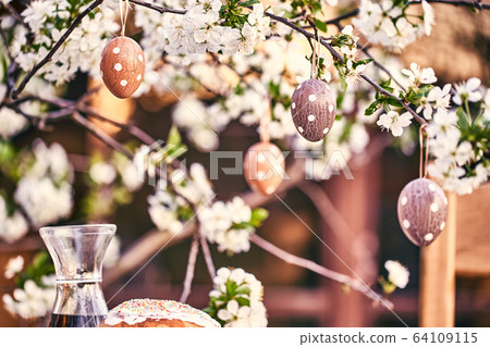 Easter eggs on bokeh colorful background. Holiday concept 64109115