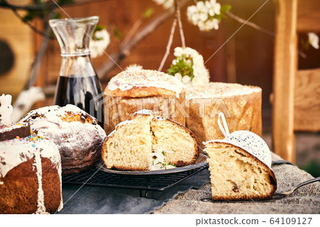 Traditional russian Easter cottage cheese dessert. Orthodox paskha, kulich cakes on table. Traditional russian Easter cottage cheese dessert. Orthodox paskha, kulich cakes on table. 64109127