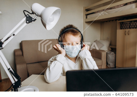boy mask learning online lesson technology laptop 64109573