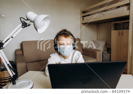 boy mask learning online lesson technology laptop 64109574