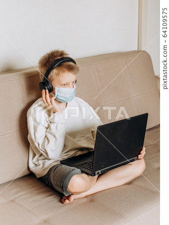 boy mask learning online lesson technology laptop 64109575