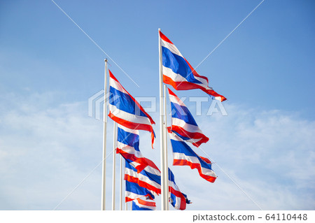 The National Flag Of Thailand with blue sky background 64110448