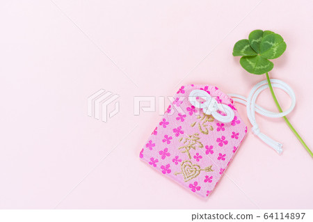 Amulet and four leaf clover Amulet and four leaf clover 64114897