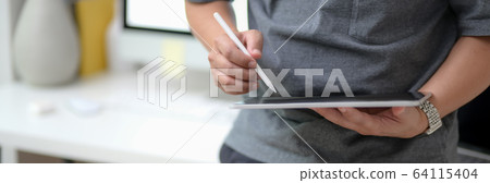 Cropped shot of male entrepreneur working on blank 64115404