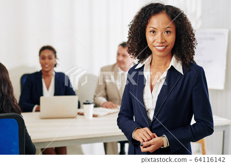 Confident smiling businesswoman Confident smiling businesswoman 64116142