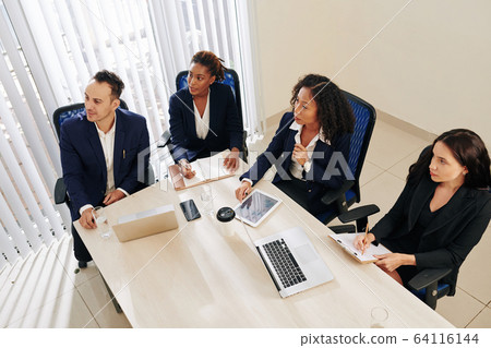 Entrepreneurs attending business training Entrepreneurs attending business training 64116144