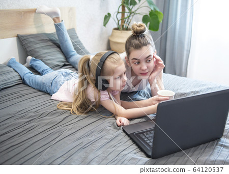 Schoolgirls  studing at home 64120537