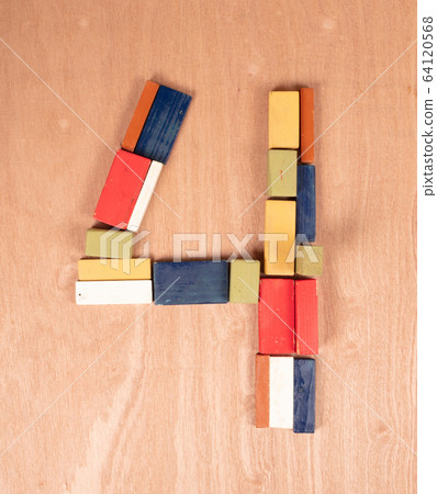 Old wooden blocks, toghether they make the number 64120568