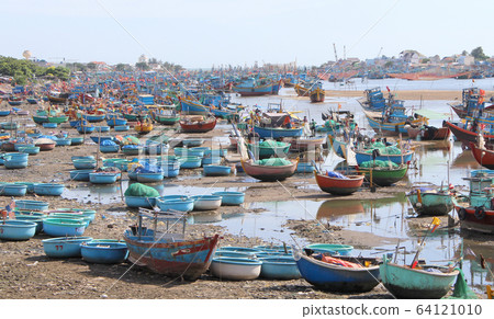 Colorful fishing boats on the beach Colorful fishing boats on the beach 64121010