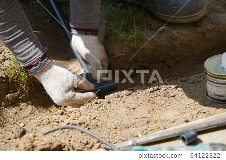 Plumber connecting water pipe joints Plumbing work Water works Plumber connecting water pipe joints Plumbing work Water works 64122822