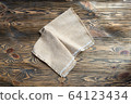 Linen napkin on wooden table, minimalism, rustic 64123434