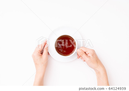 Woman hand holding coffee cup Woman hand holding coffee cup 64124939
