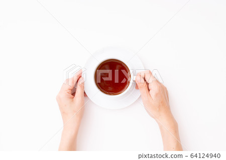 Woman hand holding coffee cup Woman hand holding coffee cup 64124940