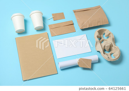 Composition with paper cups and office supplies on 64125661
