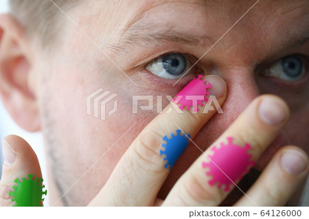 Middle-aged man touching mucous membranes Middle-aged man touching mucous membranes 64126000