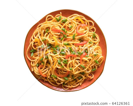 Isolated Schezwan Noodles with vegetables  64126361