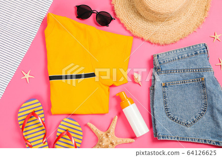 Sea vacation accessories on yellow background, top Sea vacation accessories on yellow background, top 64126625