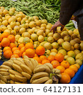 Fresh fruits on a market 64127131