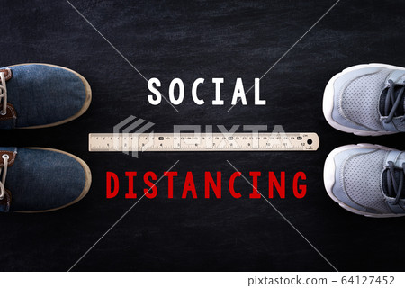 Social Distancing concept. shoes with ruler Social Distancing concept. shoes with ruler 64127452
