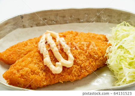 Fried white fish (with tartar sauce and shredded cabbage). Fried white fish (with tartar sauce and shredded cabbage). 64131523