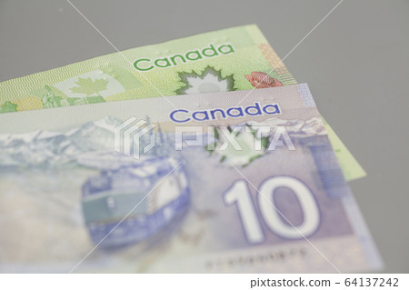 Canadian 10 and 20 dollars bank notes Canadian 10 and 20 dollars bank notes 64137242