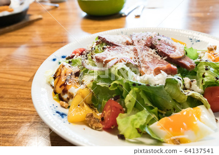 Duck breast salad, including vegetables, fruits, eggs. Duck breast salad, including vegetables, fruits, eggs. 64137541
