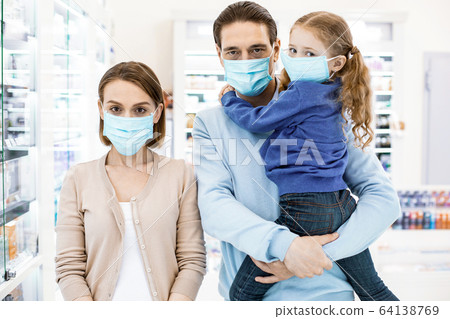 Serious unhappy family suffering from coronavirus epidemy Serious unhappy family suffering from coronavirus epidemy 64138769