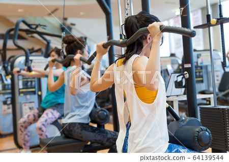 Young woman at the gym Young woman at the gym 64139544
