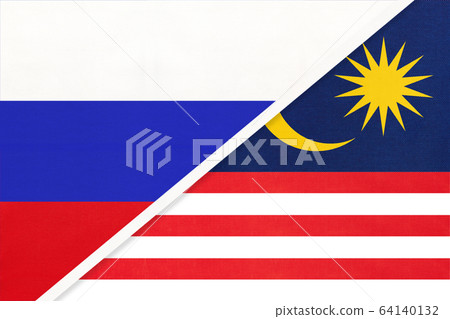 Russia vs Malaysia national flag from textile. 64140132