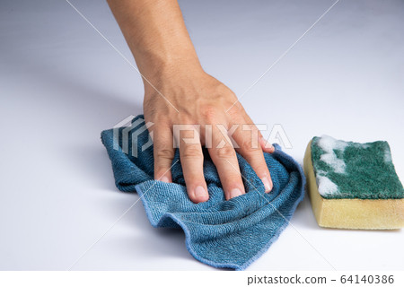washing white acrylic sheet by bare hand and blue rag sponge foam on white background stock photo washing white acrylic sheet by bare hand and blue rag sponge foam on white background stock photo 64140386