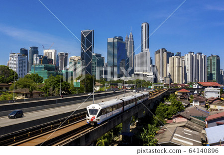 Kuala lumpur city skyline with blue sky Kuala lumpur city skyline with blue sky 64140896