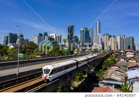 Kuala lumpur city skyline with blue sky Kuala lumpur city skyline with blue sky 64140897