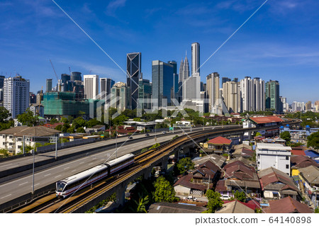Kuala lumpur city skyline with blue sky Kuala lumpur city skyline with blue sky 64140898