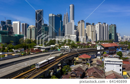 Kuala lumpur city skyline with blue sky Kuala lumpur city skyline with blue sky 64140899