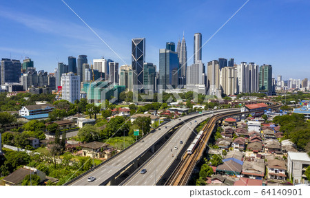 Kuala lumpur city skyline with blue sky Kuala lumpur city skyline with blue sky 64140901