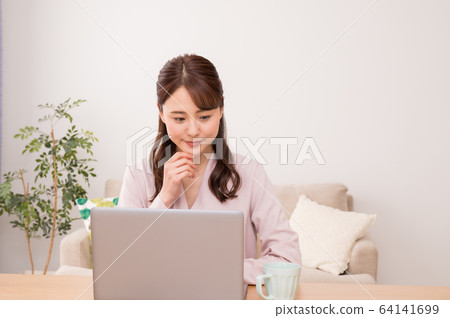 Home work young woman 64141699