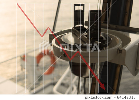 Concept of falling market in marine industry with downward graphics. Magnetic compass 64142313