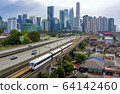 Kuala Lumpur skyline with a view of LRT train 64142460
