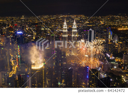 Aerial view of Kuala Lumpur city center skyline at night Aerial view of Kuala Lumpur city center skyline at night 64142472