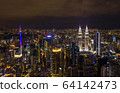 Aerial view of Kuala Lumpur city center skyline at night 64142473